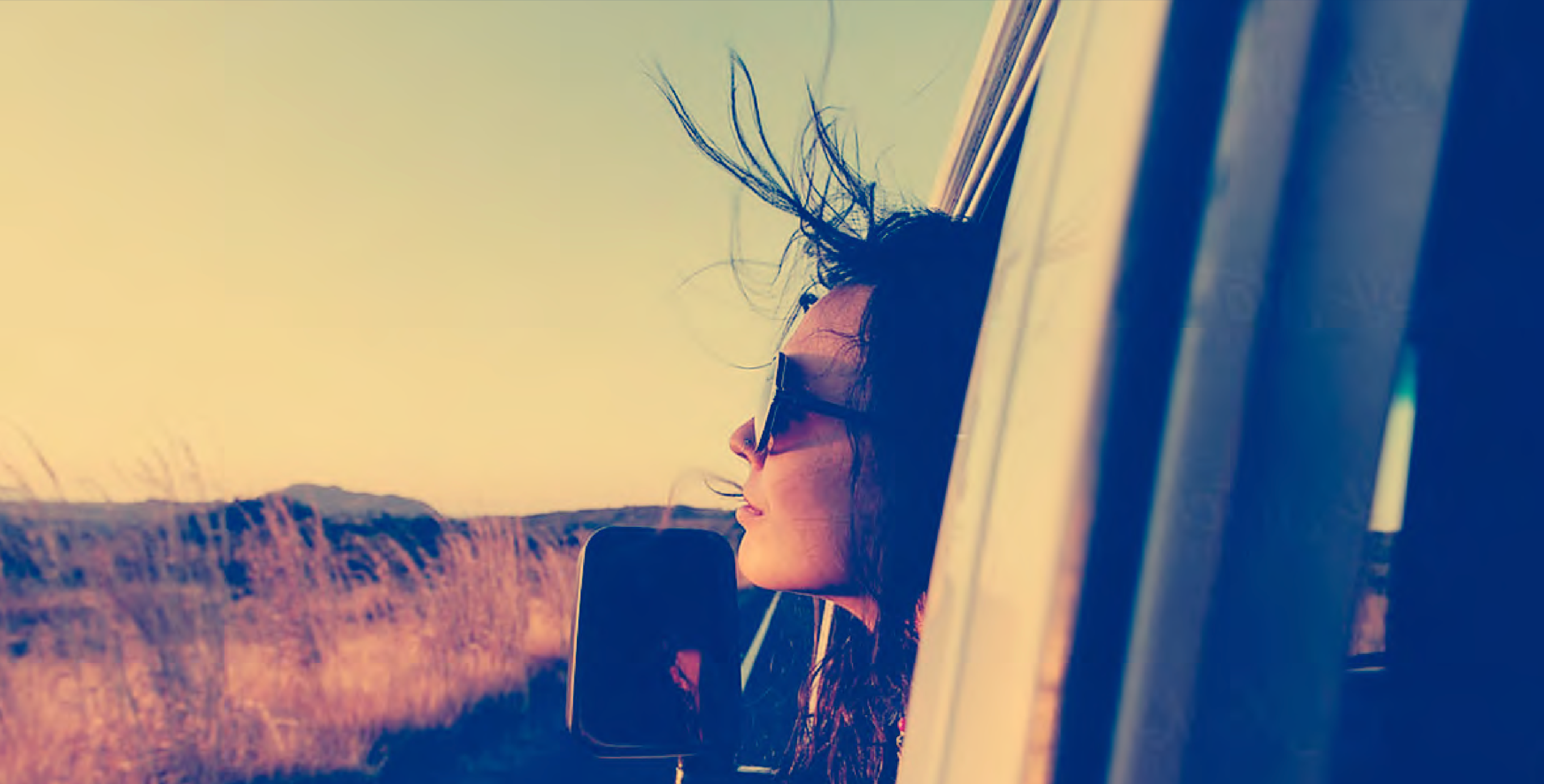 Woman looking at a sunset