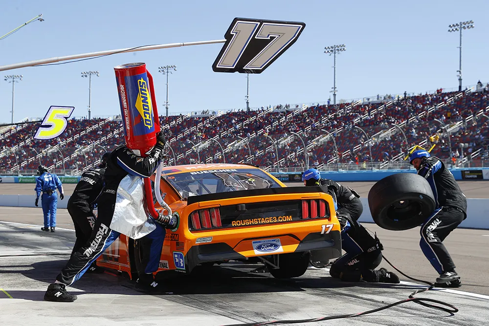 Sunoco pit crew with Sunoco fuel